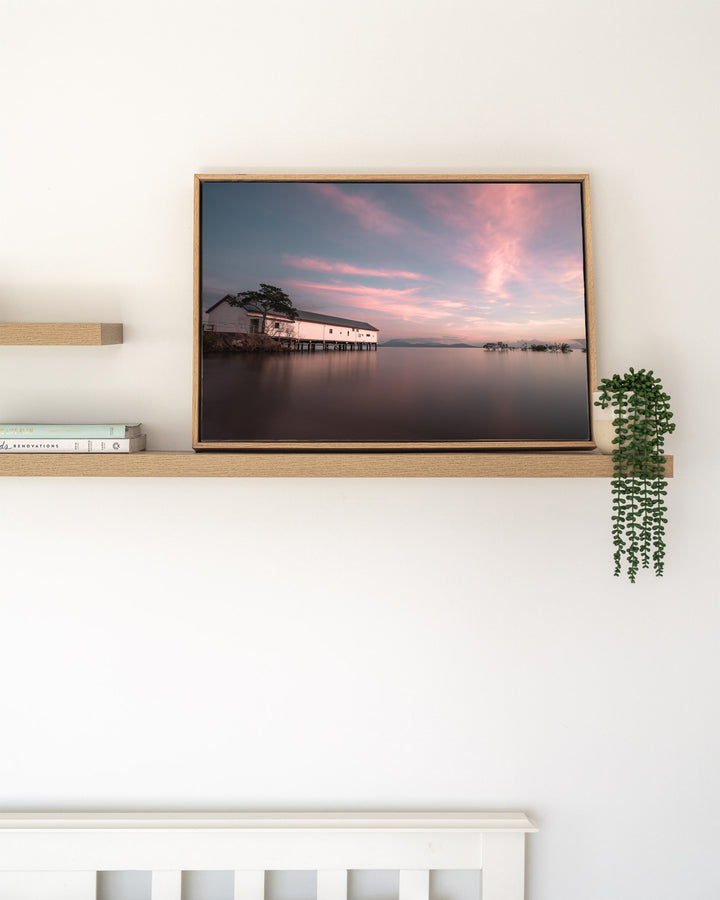 Serenity at Sugar – Port Douglas Sugar Wharf, Landscape Photography by David Lloyd, framed canvas print in oak float frame, styled in a timber shelf setting