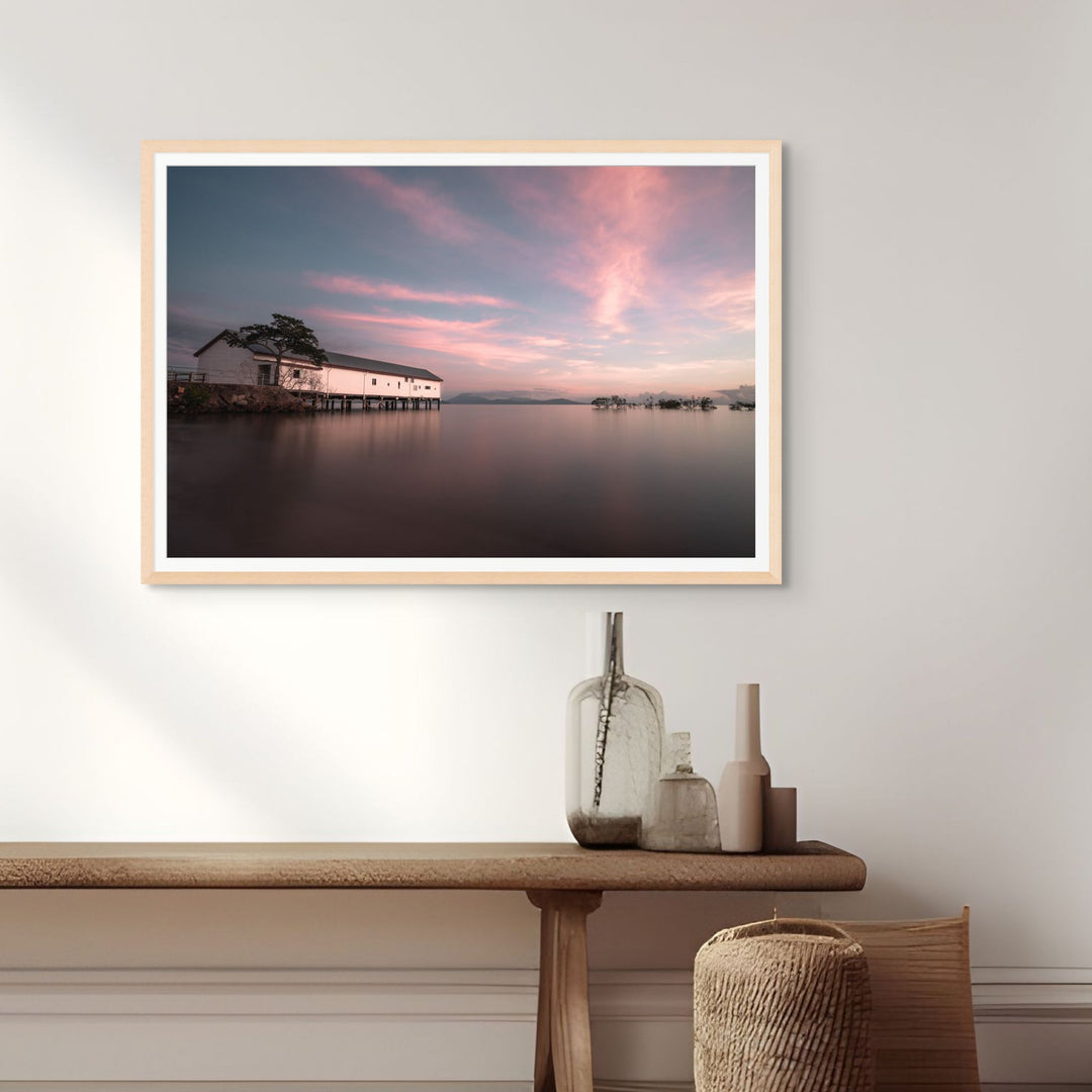 Serenity at Sugar – Aerial view of Port Douglas Sugar Wharf at sunrise with magenta-streaked sky and Four Mile Beach in background | Framed Paper Print