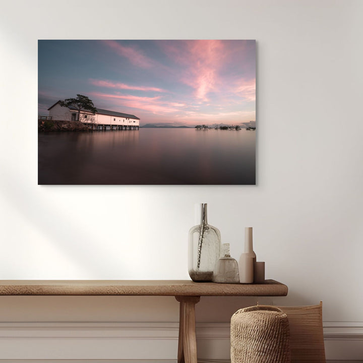 Serenity at Sugar – Aerial view of Port Douglas Sugar Wharf at sunrise with magenta-streaked sky and Four Mile Beach in background | Stretched Canvas Print