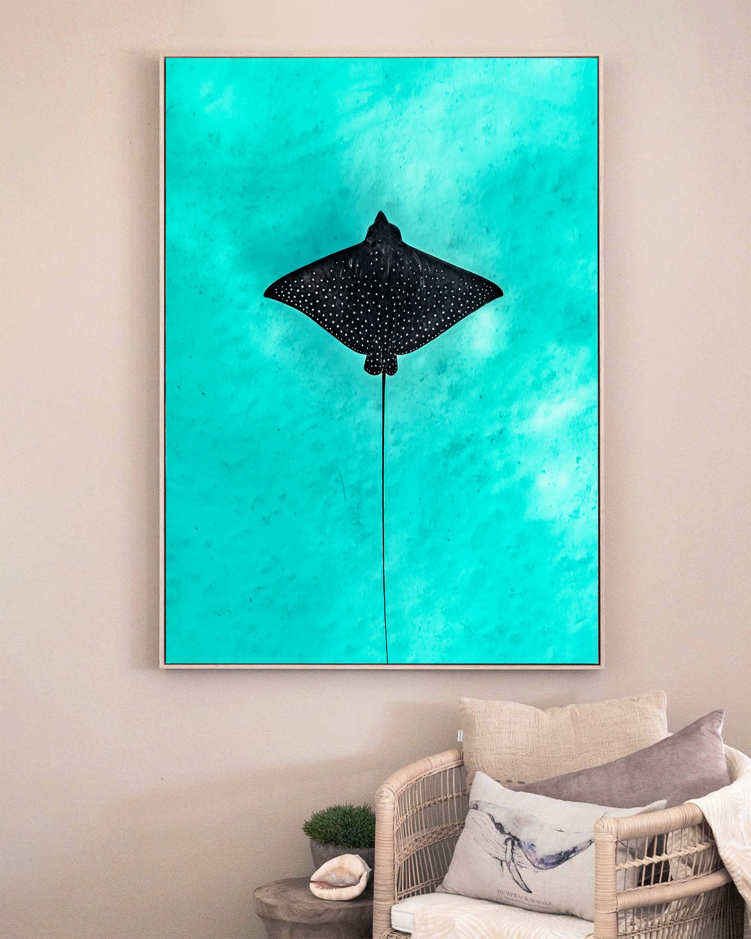 Silent Flight – Eagle Ray, Underwater Photography by David Lloyd, framed canvas print in oak float frame, styled in a sitting room setting