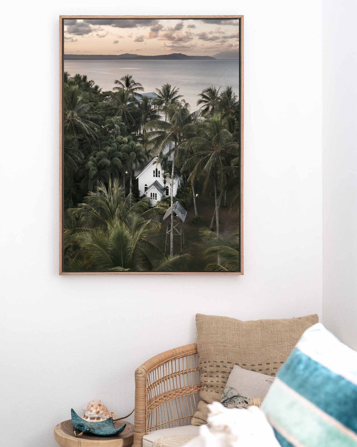 So Easy To Fall In Love – St Mary’s Chapel, Coastal Photography by David Lloyd, framed canvas print in oak float frame, styled in a coastal lounge setting