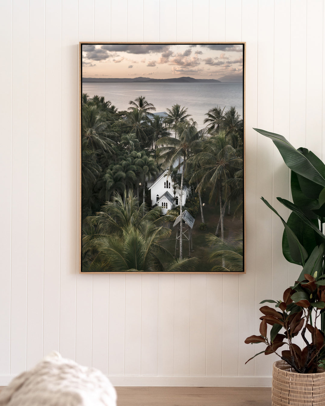 So Easy To Fall In Love – St Mary’s Chapel, Coastal Photography by David Lloyd, framed canvas print in oak float frame, styled in a living room setting