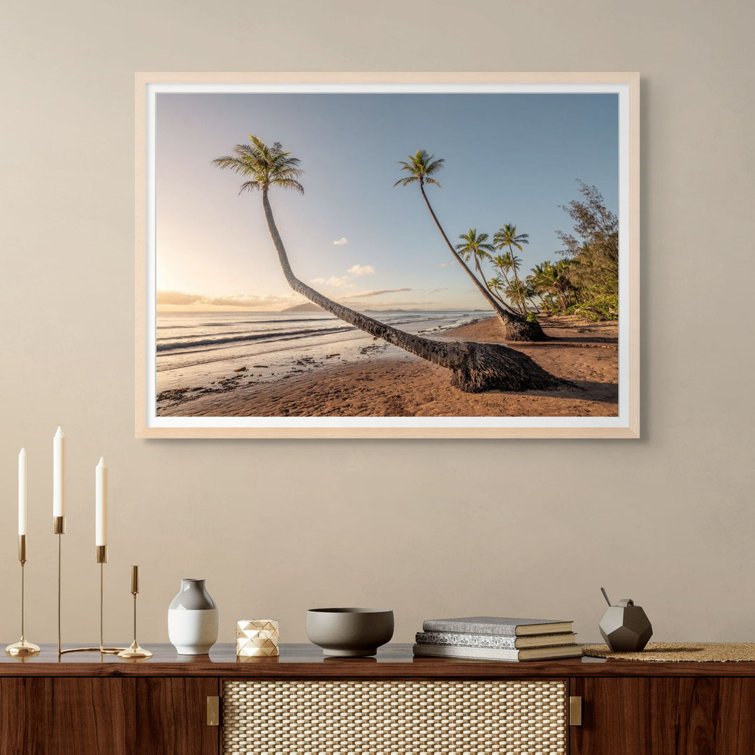 Taken with the Tide – Aerial view of Mission Beach at first light, golden hour over palm trees, tide rising and waves softly breaking on the shore | Framed Paper Print