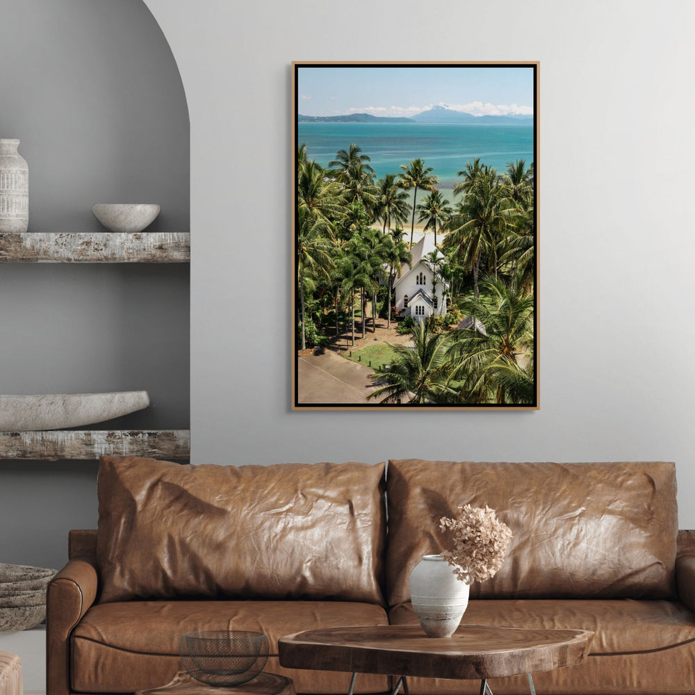 The Art of Loving – bright coastal photograph of St Mary’s Chapel in Port Douglas surrounded by tropical palm trees and ocean backdrop | Shadow Box Canvas Print