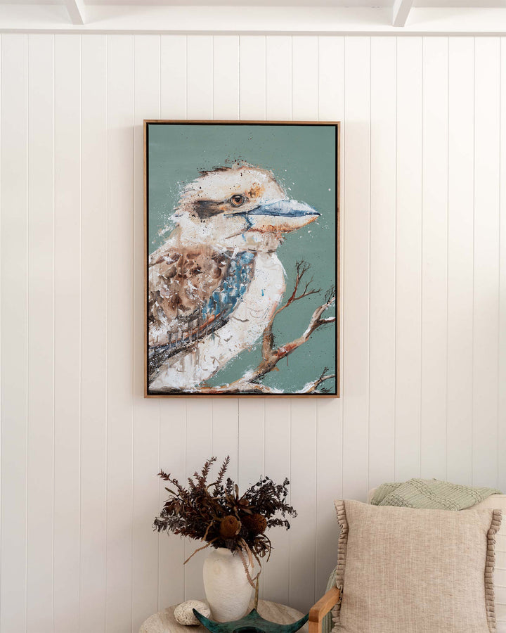 The Early Bird – kookaburra, framed canvas in oak float frame, styled in a bedroom