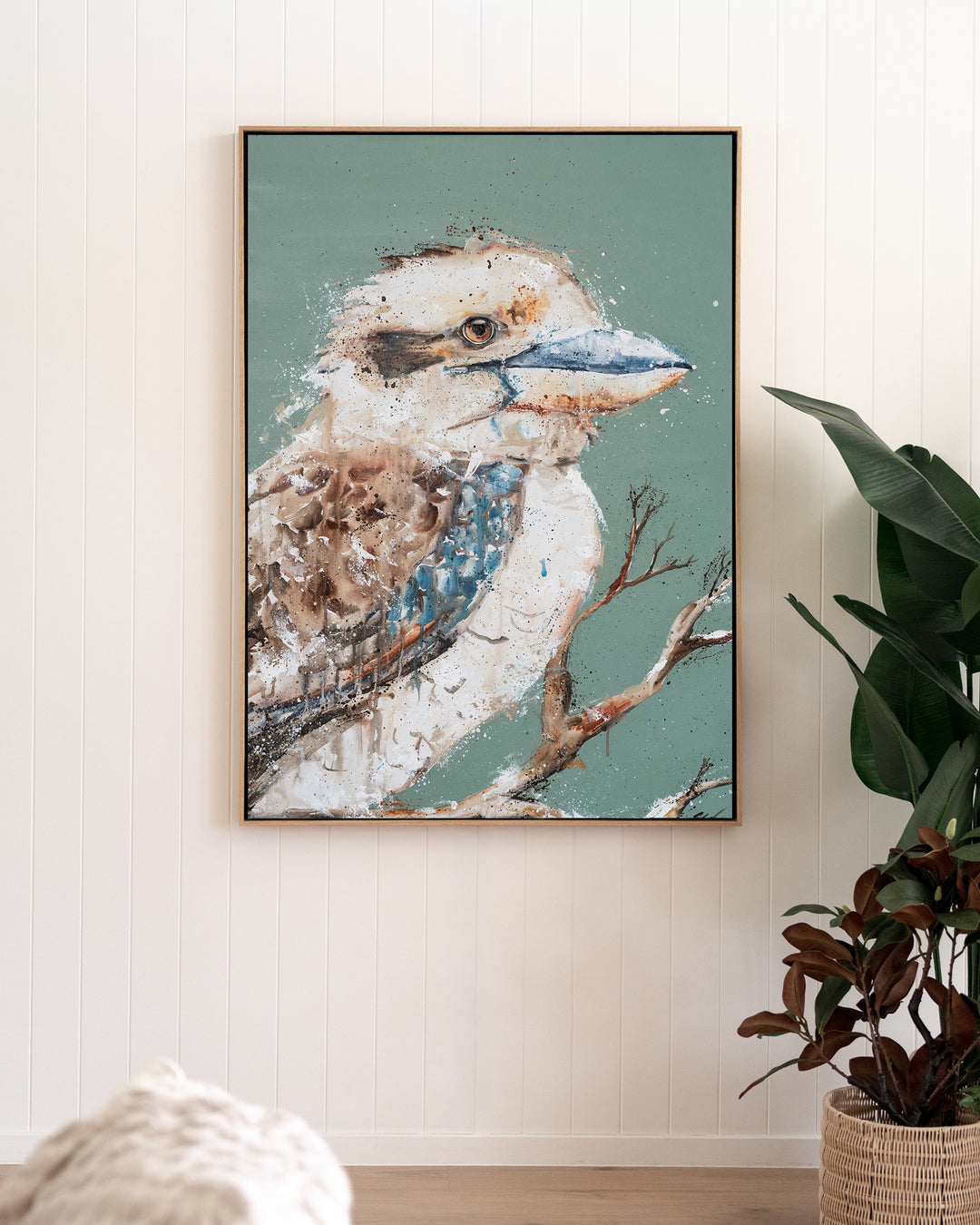 The Early Bird – kookaburra, framed canvas in oak float frame, styled in a living room