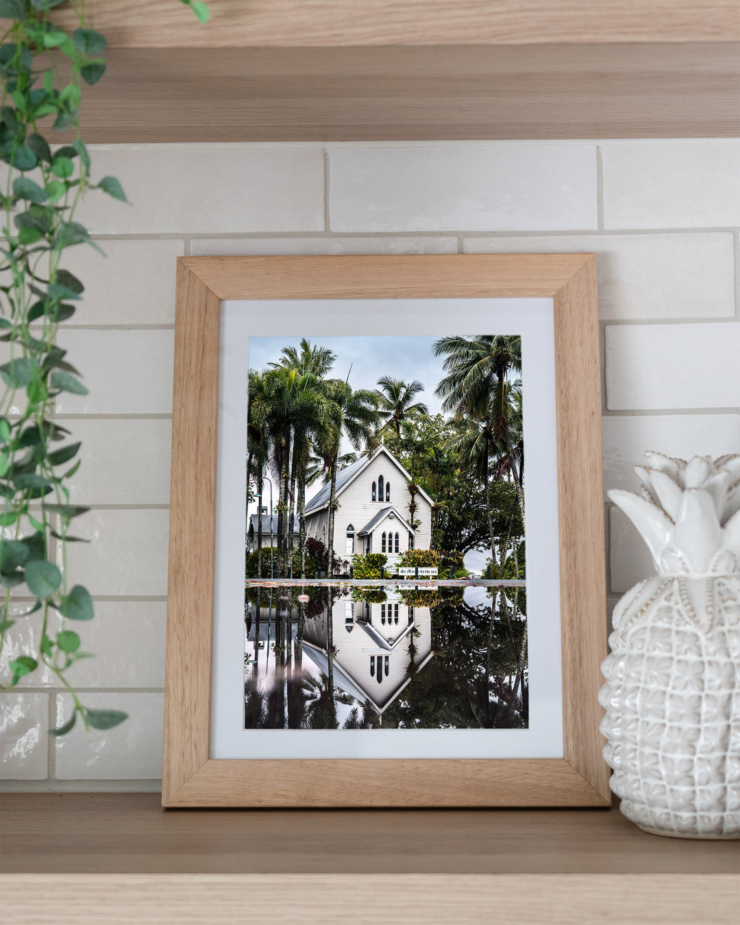 This Too Shall Pass – St Mary’s By The Sea, Landscape Photography by David Lloyd, framed paper print in oak frame, styled in a kitchen shelf setting