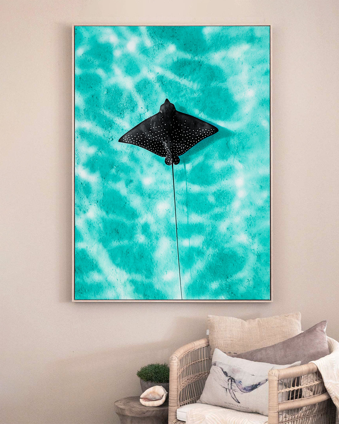 Turquoise Tranquility – Eagle Ray, Underwater Photography by David Lloyd, framed canvas print in oak float frame, styled in a sitting room setting