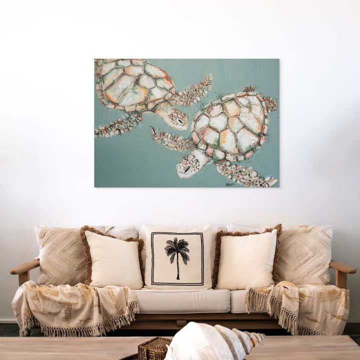 Two’s Company – sea turtle artwork on green background as stretched canvas print styled above sofa | Stretched Canvas Print
