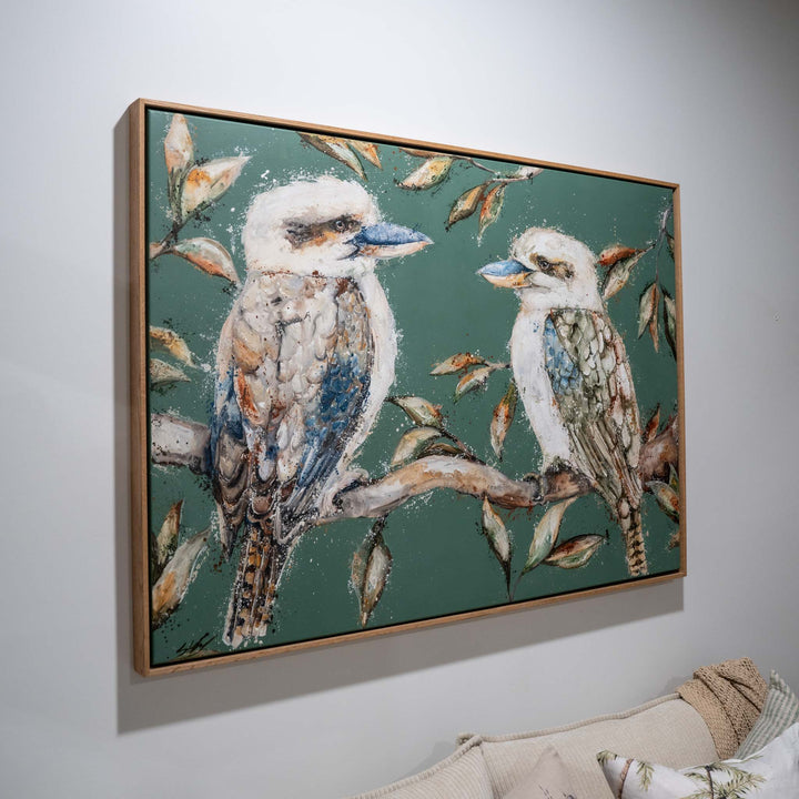 ‘We Belong Together’ framed artwork displayed above a light couch in a bright, modern living space.