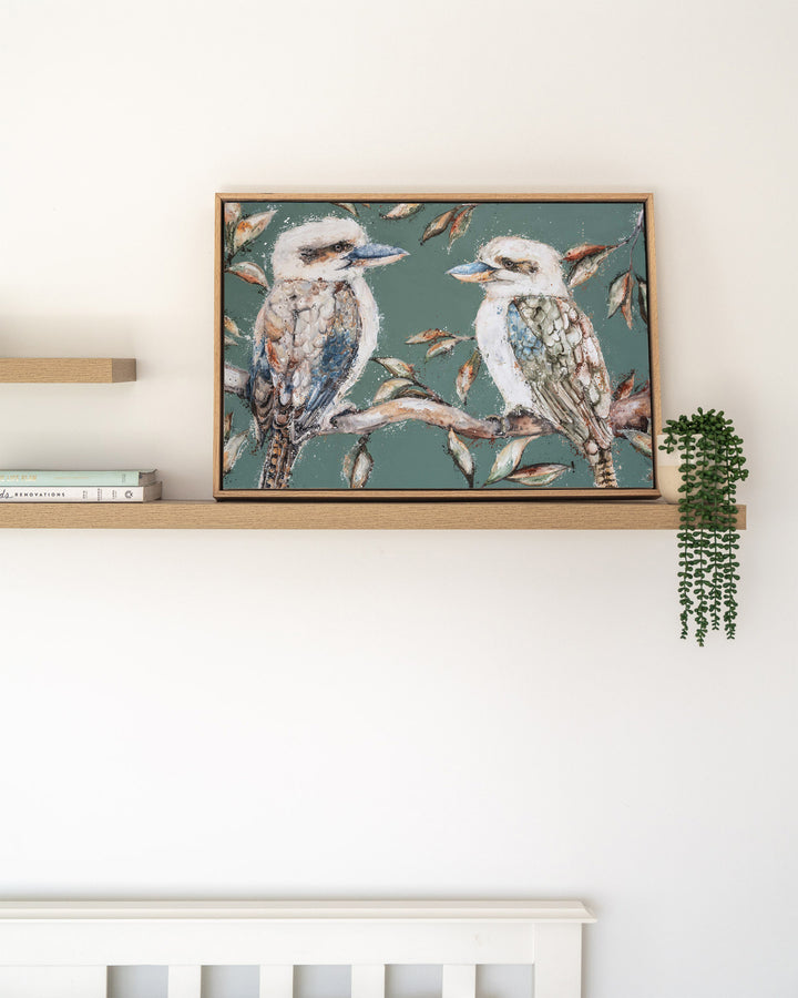 We Belong Together – kookaburras, framed canvas in oak float frame, styled on a floating shelf
