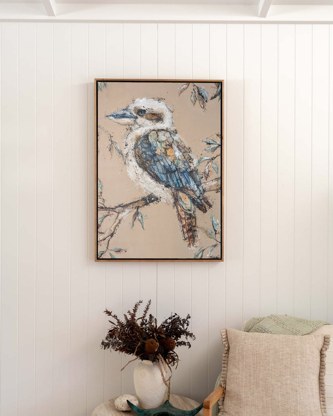 Whittaker – kookaburra, framed canvas in oak float frame, styled in a bedroom