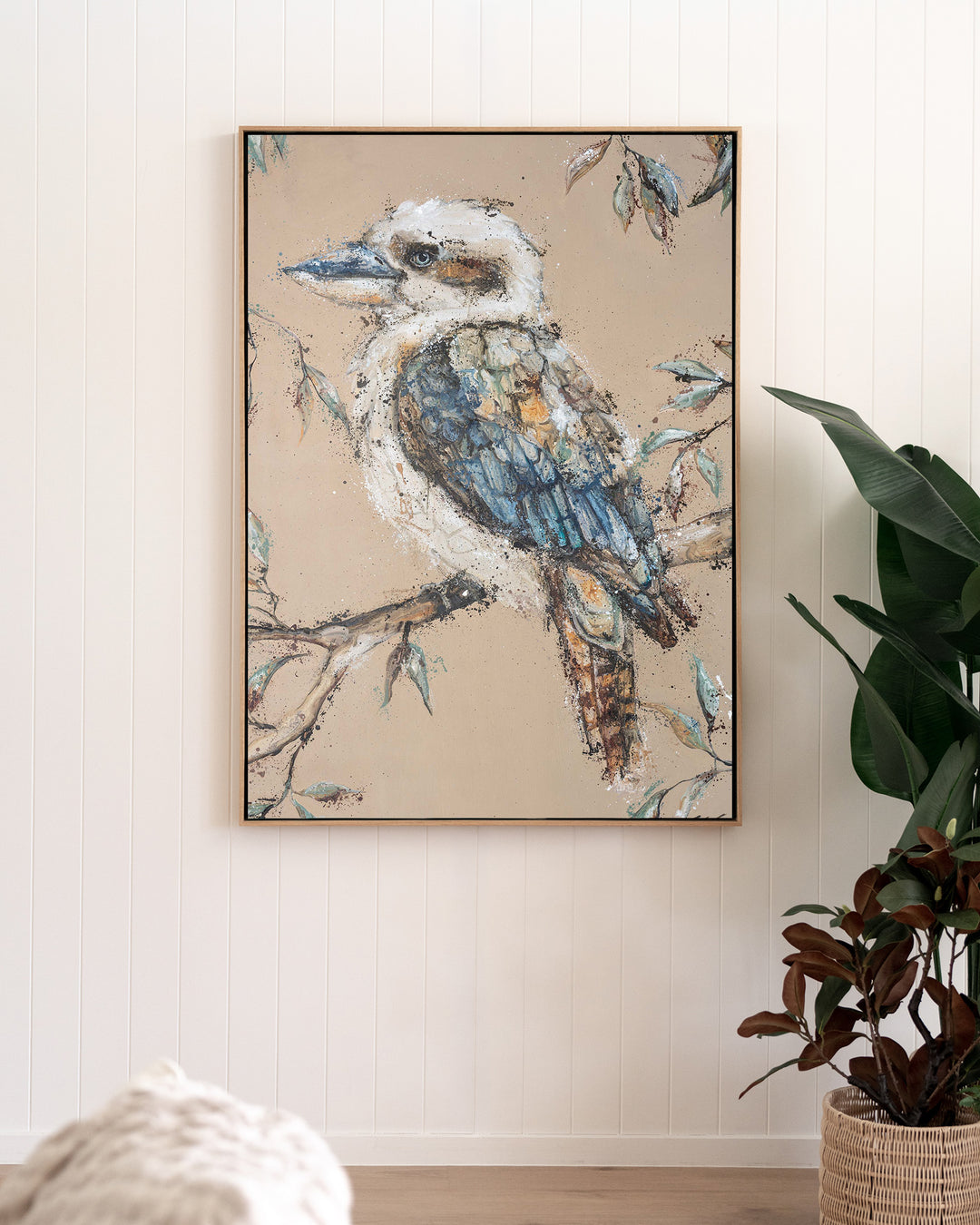 Whittaker – kookaburra, framed canvas in oak float frame, styled in a living room