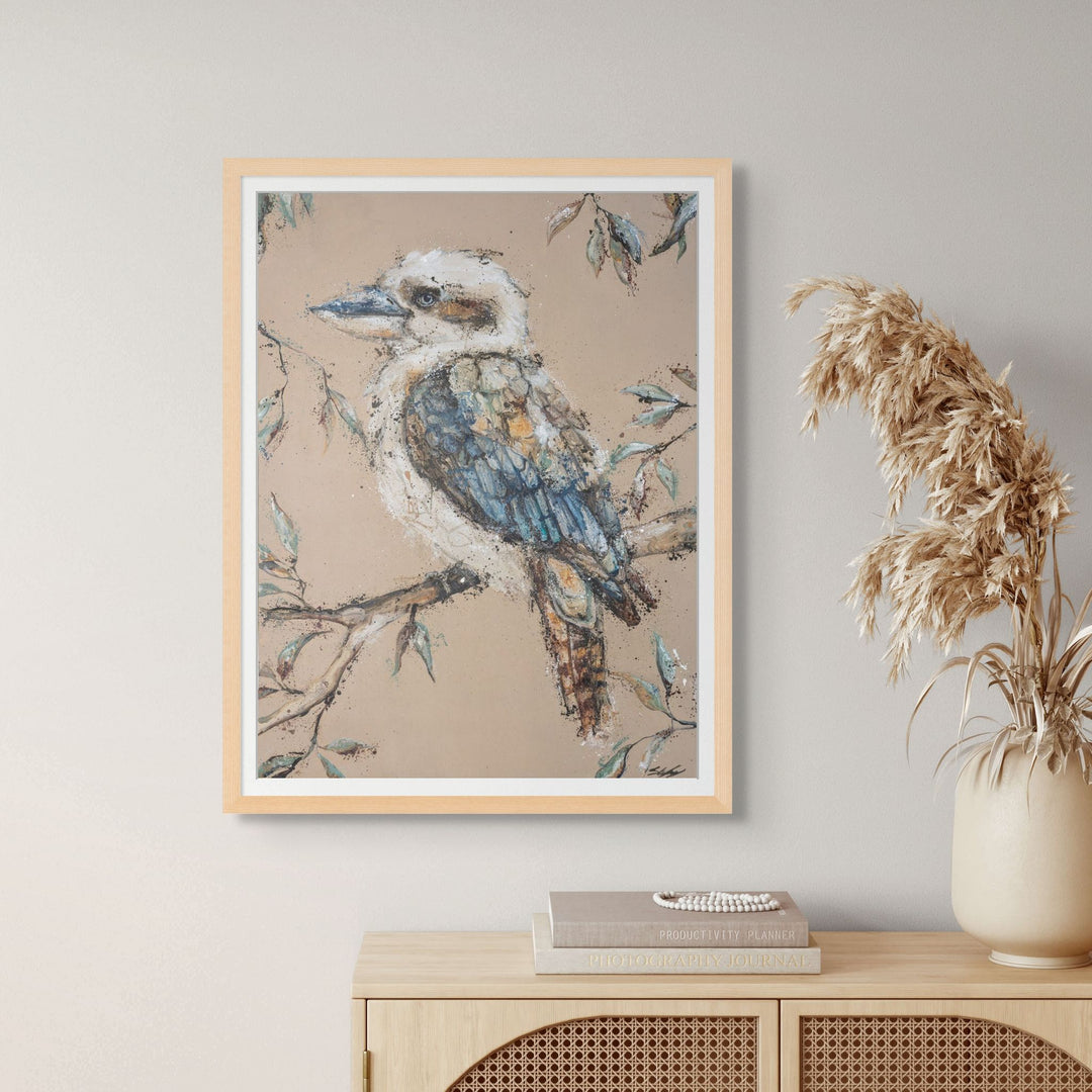 Matted oak frame presentation of Whittaker by Stephanie Elizabeth featuring a kookaburra on a soft neutral background.